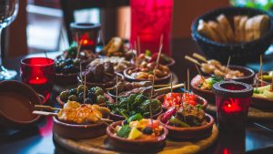 Plates of tapas filling the table